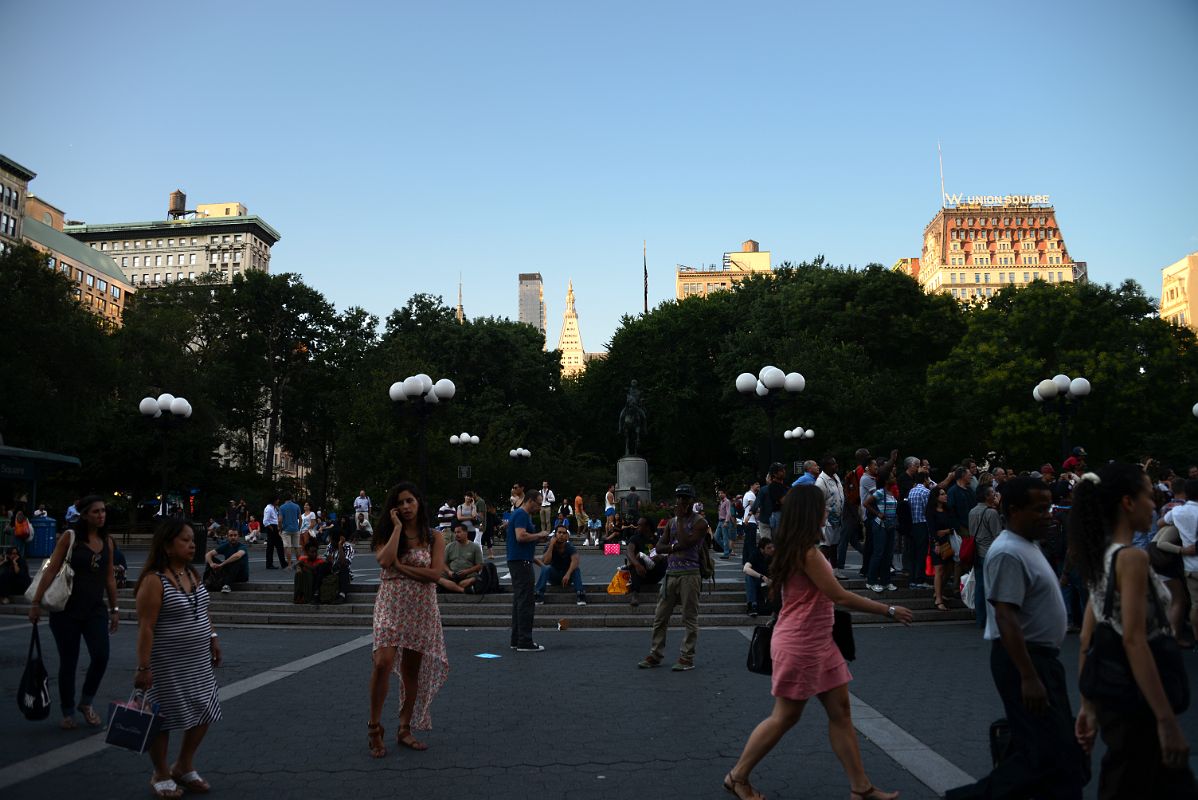 09 People Mill About As The Sun Sets On Union Square Park New York City